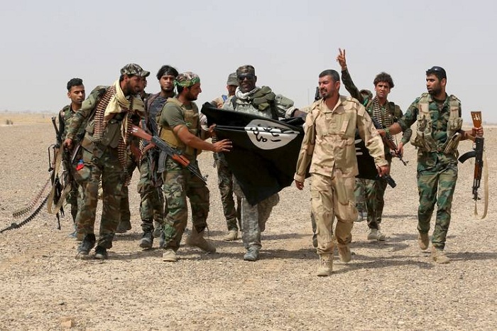 Iraq Shi`ite paramilitary calls for ban on US nationals
